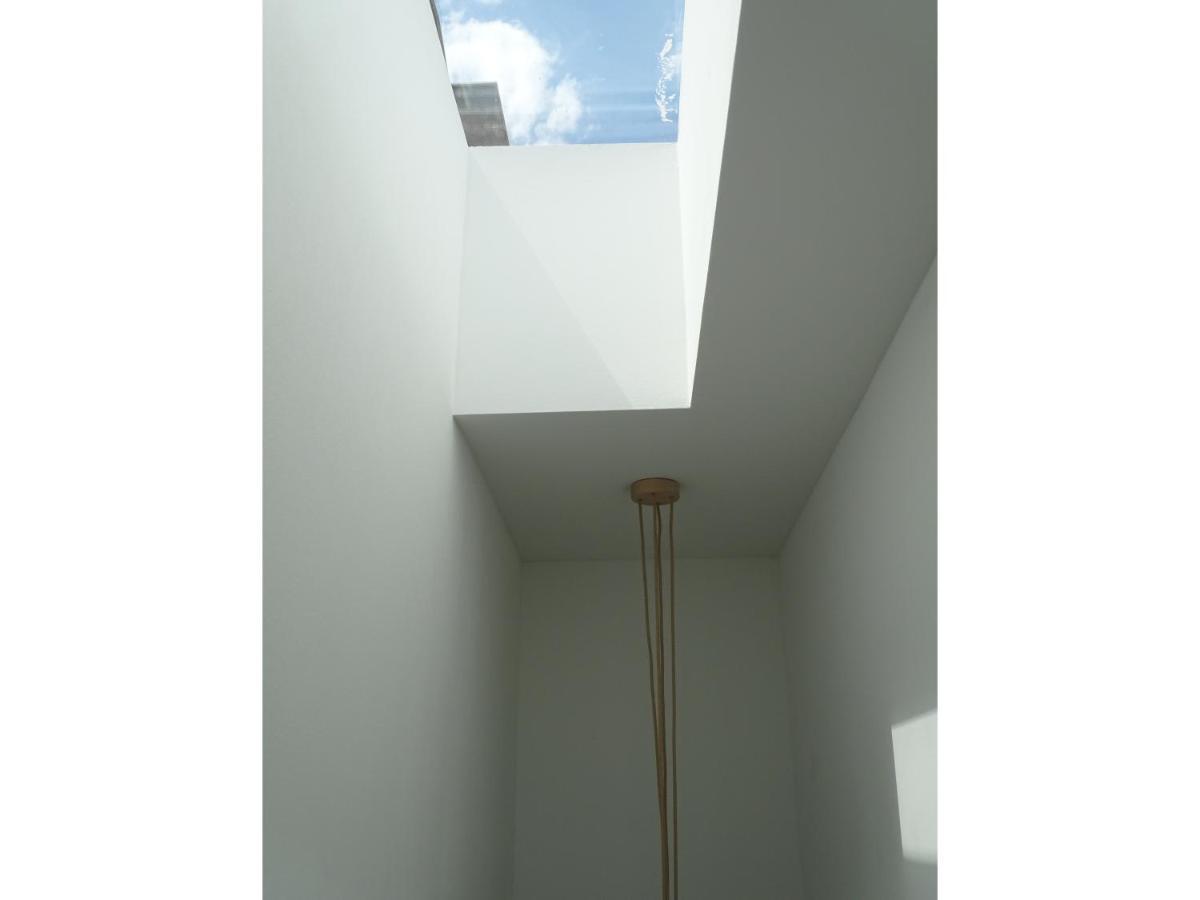 Modern Small House With A Terrace Split Exterior photo